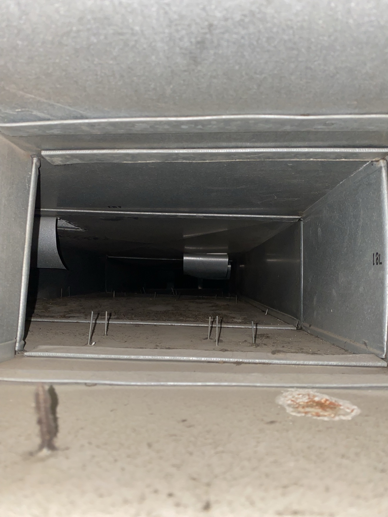 Inside a sheet metal supply main line